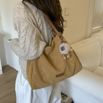 Ženska torba u korejskom retro stilu s velikim kapacitetom, model 2026, elegantna dnevna tote torba za nošenje na rame ili crossbody.
