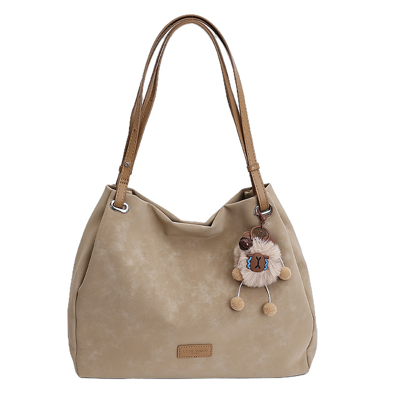 Ženska torba u korejskom retro stilu s velikim kapacitetom, model 2026, elegantna dnevna tote torba za nošenje na rame ili crossbody.