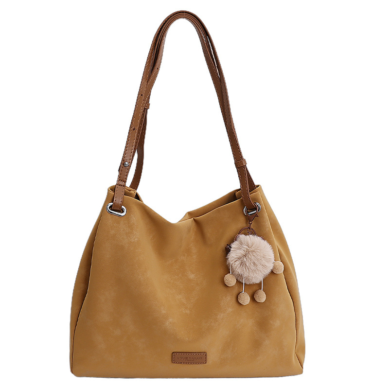 Ženska torba u korejskom retro stilu s velikim kapacitetom, model 2026, elegantna dnevna tote torba za nošenje na rame ili crossbody.