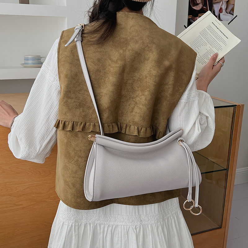 PU mini kvadratna crossbody torba, ulični modni dizajn, proljeće 2026, vintage minimalistički stil, ženska dnevna torba s dojmlom vrhunske kvalitete