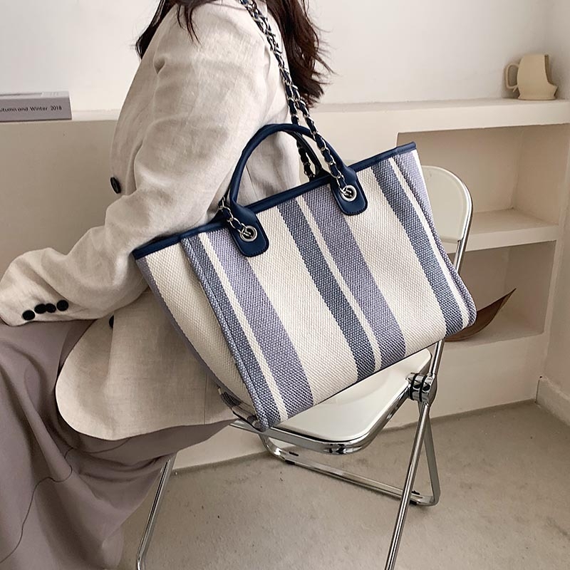 Nova torba u korejskom stilu 2025., ramenska i crossbody torba s velikim kapacitetom, prugasti lanac, bucket torba, ženska torba