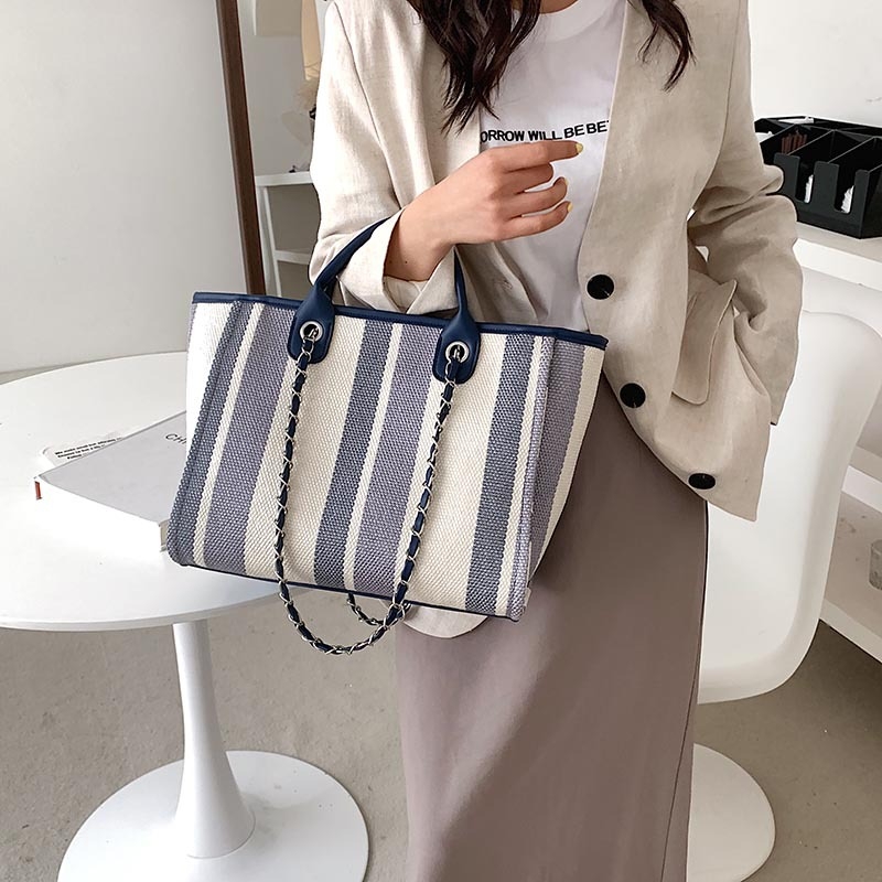 Nova torba u korejskom stilu 2025., ramenska i crossbody torba s velikim kapacitetom, prugasti lanac, bucket torba, ženska torba