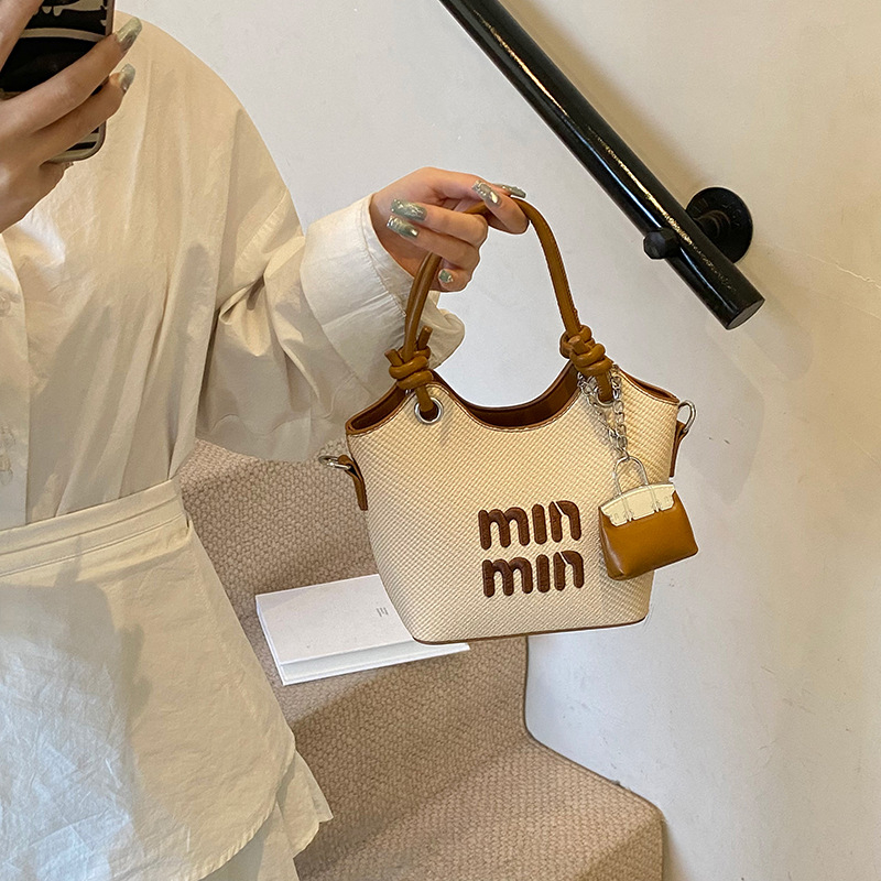 Ženska torbica tipa kanta, PU koža, gradski stil, crossbody, srednja veličina, proljeće 2025