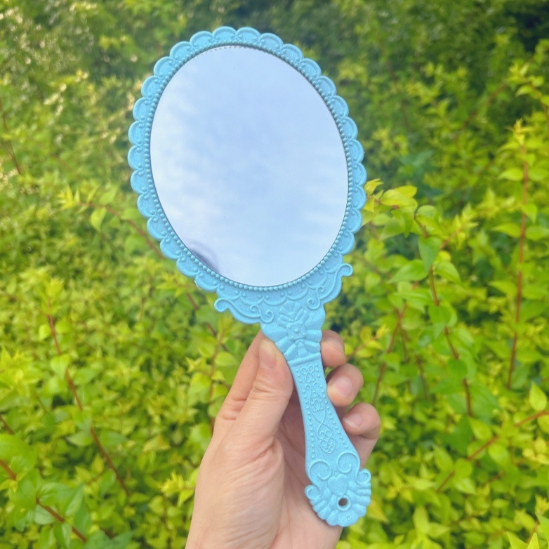Kézi sminktükör retro mintával, 25×11 cm, műanyag keret, alumínium tükör