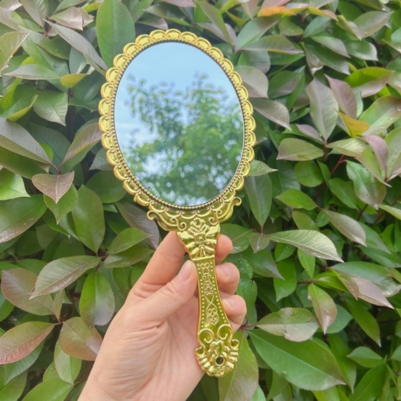 Kézi sminktükör retro mintával, 25×11 cm, műanyag keret, alumínium tükör