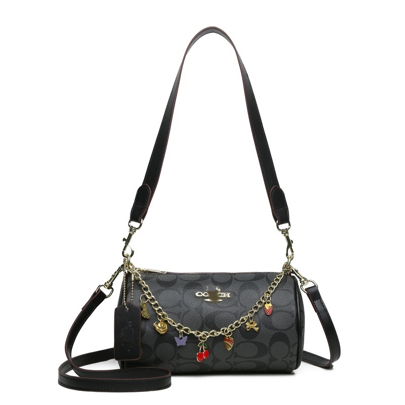 Torba u obliku jastuka s monogramom i lancem — cilindrična PU crossbody