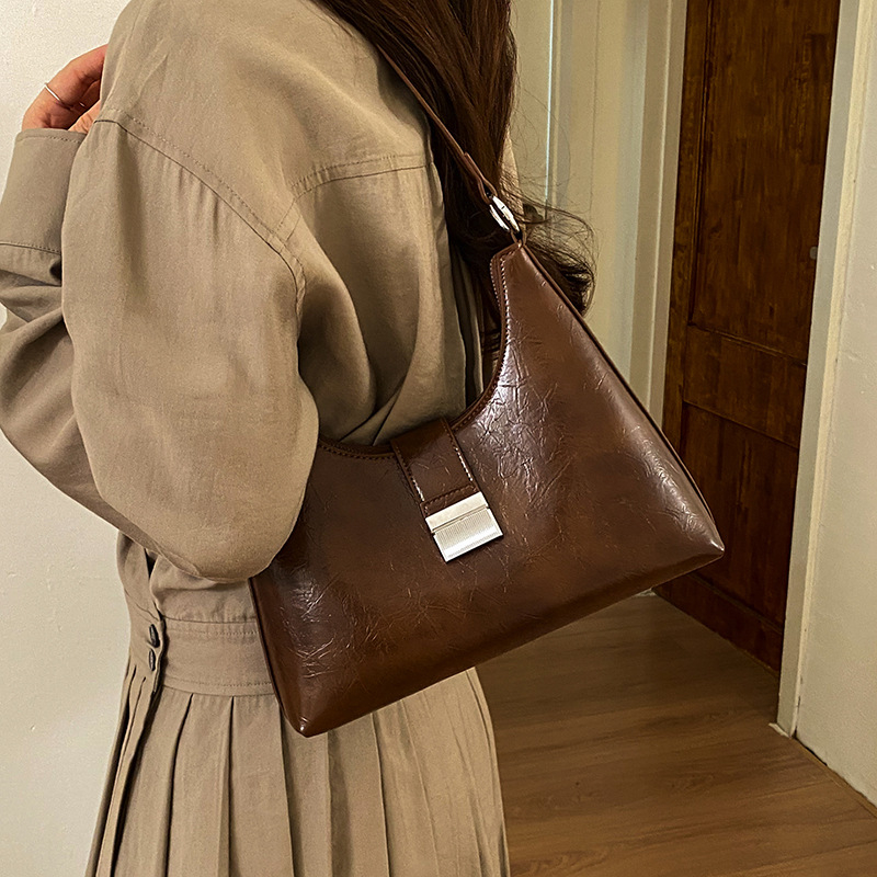 Ženska torbica u francuskom stilu, ispod pazuha, vintage casual crossbody, proljeće 2026