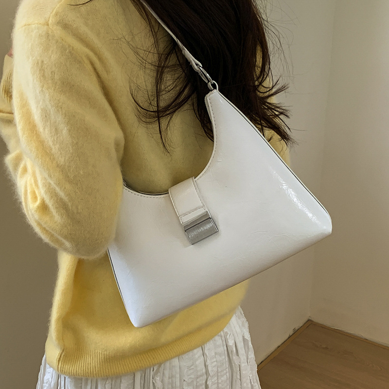 Ženska torbica u francuskom stilu, ispod pazuha, vintage casual crossbody, proljeće 2026