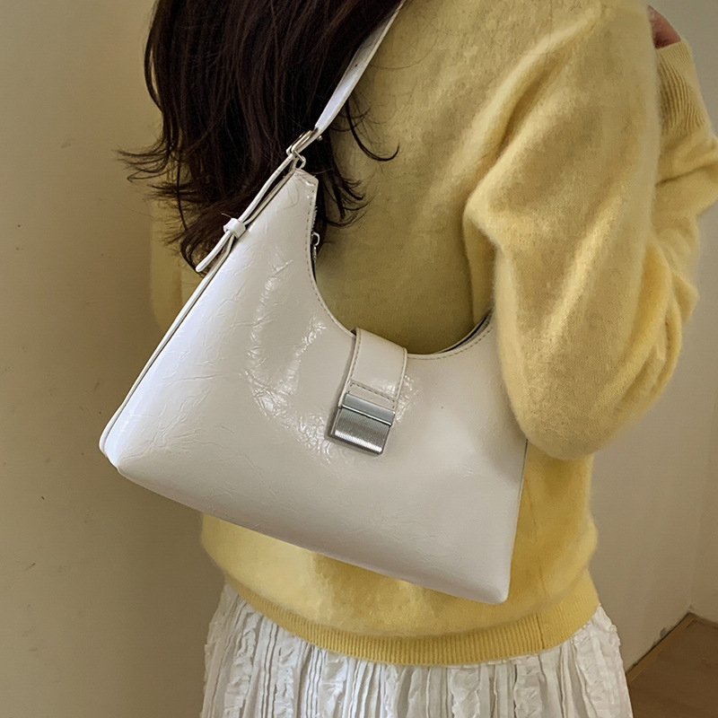 Ženska torbica u francuskom stilu, ispod pazuha, vintage casual crossbody, proljeće 2026