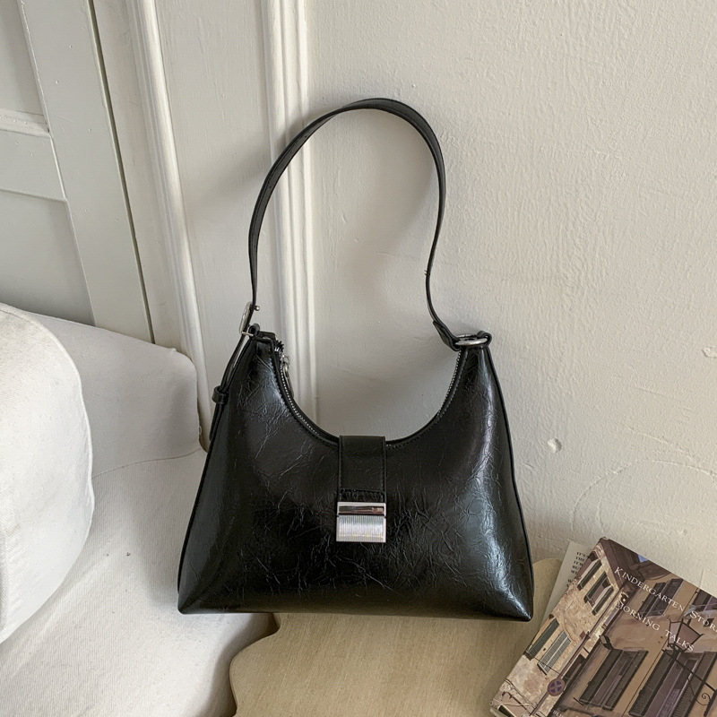 Ženska torbica u francuskom stilu, ispod pazuha, vintage casual crossbody, proljeće 2026