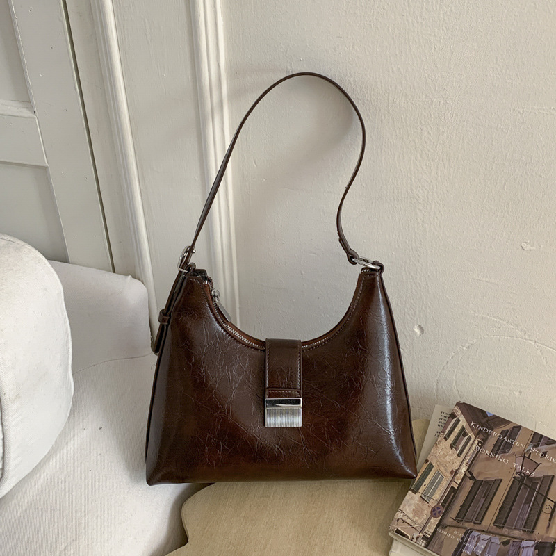 Ženska torbica u francuskom stilu, ispod pazuha, vintage casual crossbody, proljeće 2026