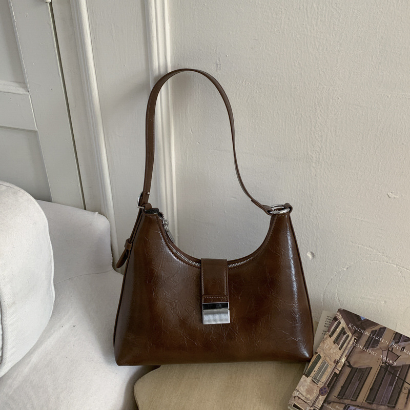 Ženska torbica u francuskom stilu, ispod pazuha, vintage casual crossbody, proljeće 2026