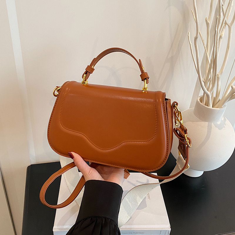 Ženska PU torbica, sedlo-stila, mala, preko ramena ili crossbody, proljeće 2025, za svakodnevnu upotrebu