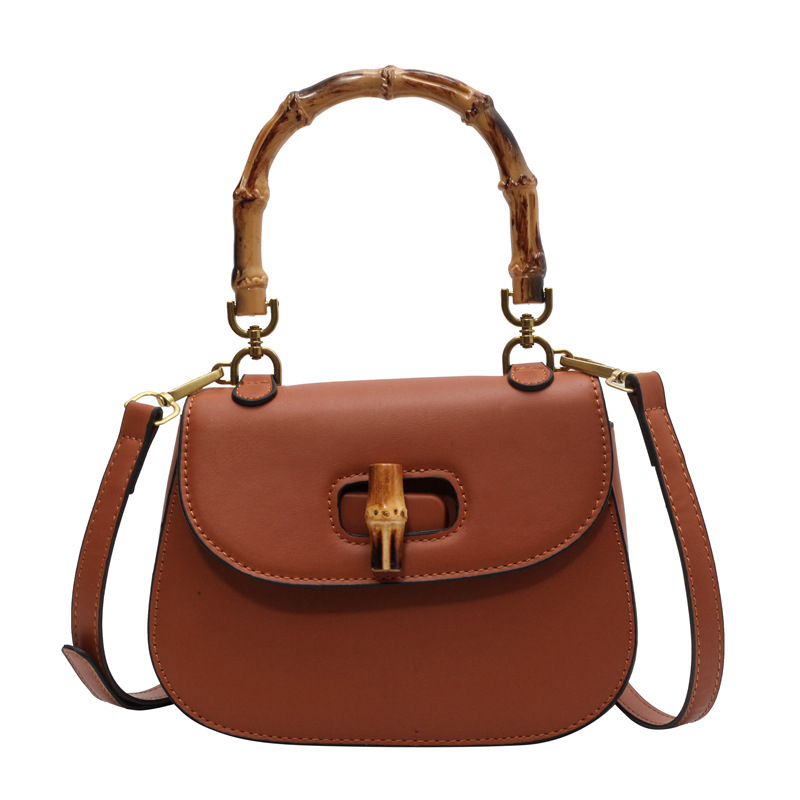 Vrhunska retro sedlovita torba s bambusnom ručkom, ljeto 2026, moderna i svestrana za rame i crossbody