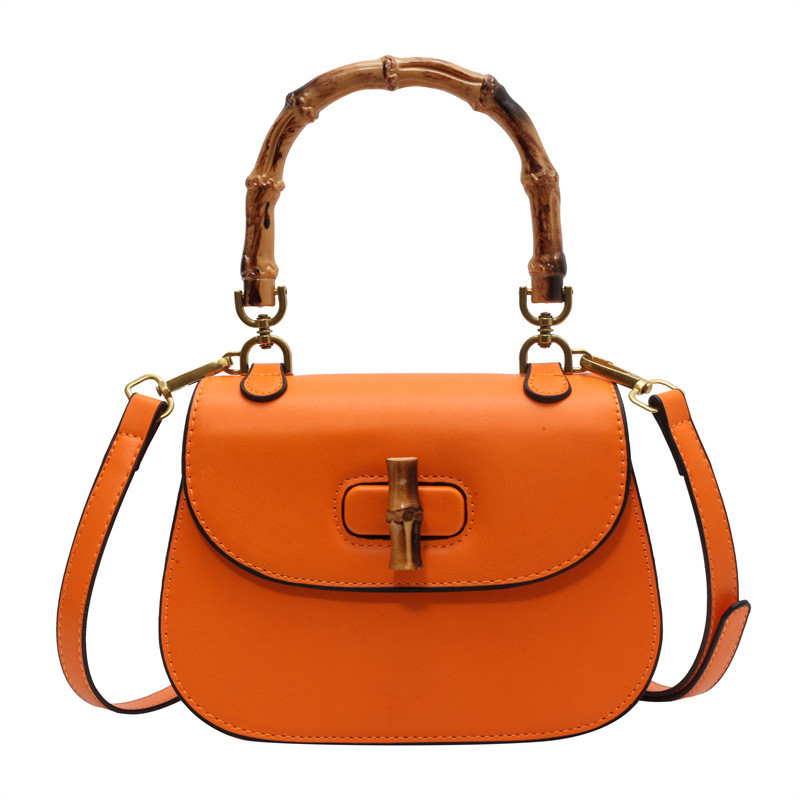 Vrhunska retro sedlovita torba s bambusnom ručkom, ljeto 2026, moderna i svestrana za rame i crossbody