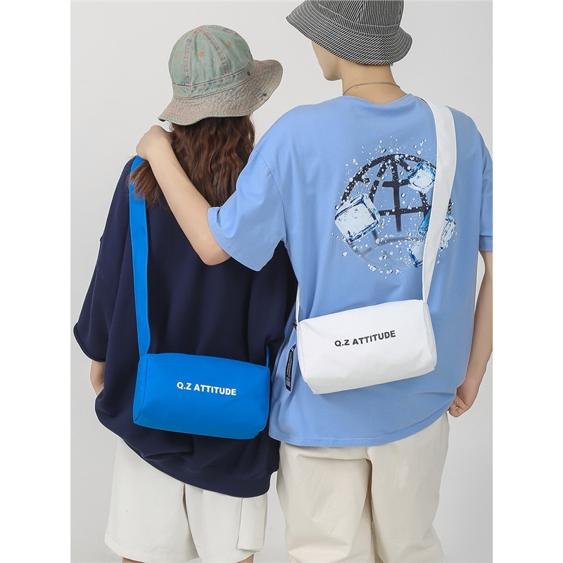 Unisex crossbody torba, lagana i kompaktna cilindrična torba za svakodnevne aktivnosti, vožnju biciklom, sport i jogu. Materijal Oxford platno, zatvarač, unutarnja džep za telefon, jednostruka naramenica.