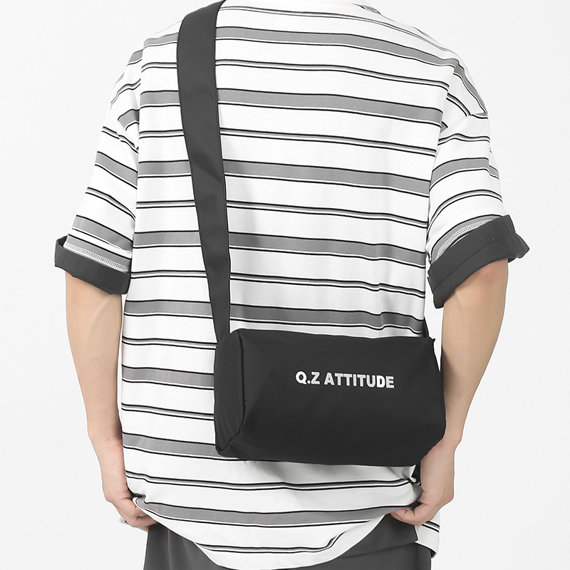 Unisex crossbody torba, lagana i kompaktna cilindrična torba za svakodnevne aktivnosti, vožnju biciklom, sport i jogu. Materijal Oxford platno, zatvarač, unutarnja džep za telefon, jednostruka naramenica.