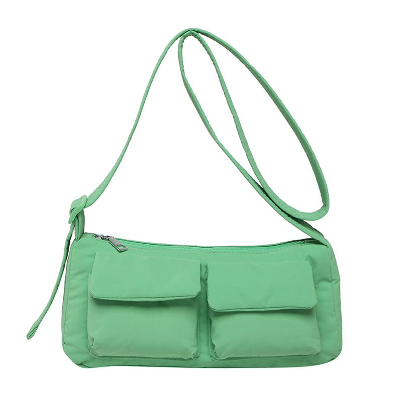 Casual lagana torba preko ramena za svakodnevnu upotrebu, s višestrukim džepovima, crossbody stil, proljeće 2026.