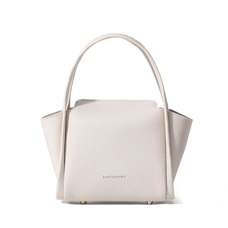 2025 minimalistička jednobojna kanta torba, nišnog dizajna, inspirirana košarom za povrće, zapadnjački stil, svakodnevna crossbody torba.