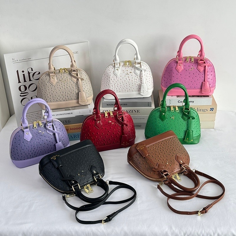 Ženska torbica u obliku školjke, europsko–američki stil, jedinstven dizajn, novi model 2026, stilizirana i minimalistička torba preko ramena, crossbody za svakodnevnu upotrebu