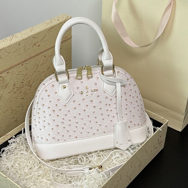 Ženska torbica u obliku školjke, europsko–američki stil, jedinstven dizajn, novi model 2026, stilizirana i minimalistička torba preko ramena, crossbody za svakodnevnu upotrebu