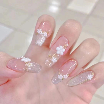 Kézzel készített felhelyezhető műkörmök sakura virág és cat-eye mintával, finom fehér virágos francia végződések, újrahasználható gél körmök
