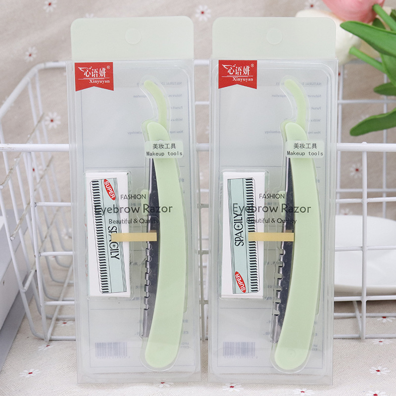 Rozsdamentes acélból készült professzionális szemöldök-trimmelő összecsukható pengetartóval és cserélhető pengékkel