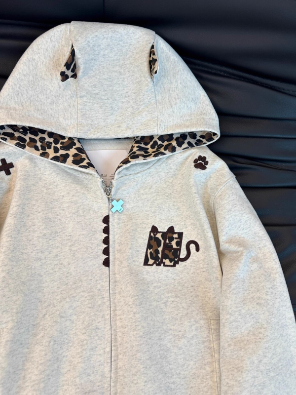 Ženska jakna s kapuljačom i leopard patchworkom, gradski elegantan stil, zatvarač