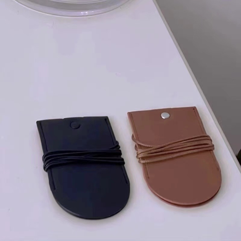 Mini kožna torbica za ključeve s kožnim užetom i izvučnim dizajnom, modni dodatak