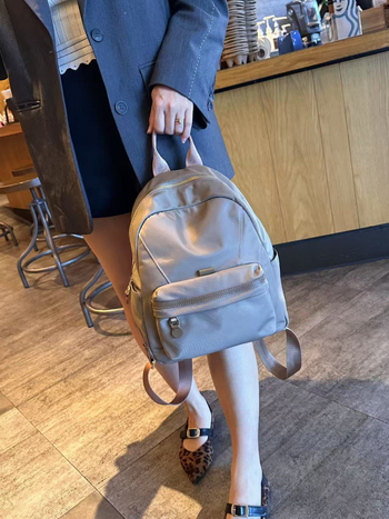 Vodootporan ruksak od najlona s kožnim detaljima od kravlje kože, za žene, model 2026, visokokvalitetan minimalistički putni ruksak