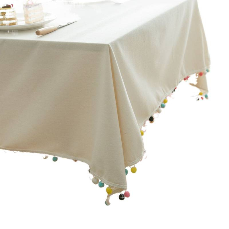 Skandinavska stolnjna krpa s pomponama, krem boja, pravokutni oblik, cvjetni uzorak, moderni minimalistički stil