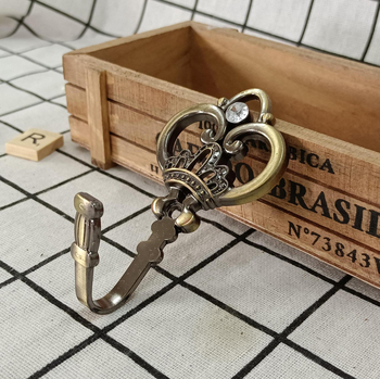 QX-120 Mala kruna zavjesa kuka, cink legura, crni metalni završetak, europski stil, za zid/prozor