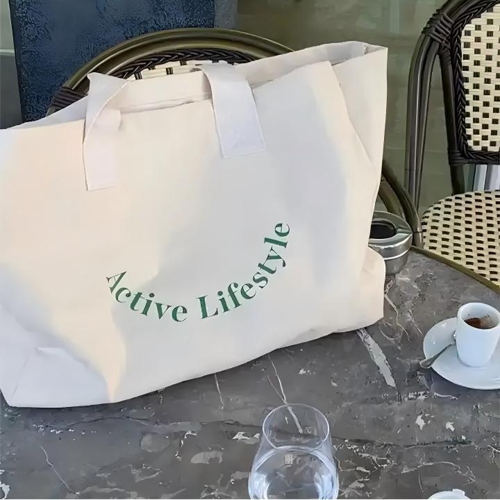 Platnena torba preko ramena, velika kapaciteta, s slovima, minimalistički i trendovski dizajn, lagana za nošenje na otvorenom, personalizirana za kupovinu