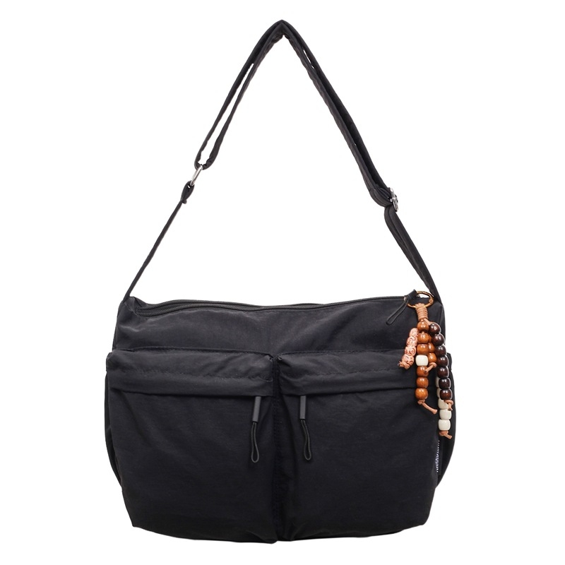 Nova jesensko–zimska crossbody torba s višestrukim džepovima i velikim kapacitetom, moderan minimalistički stil, ležeran i svestran