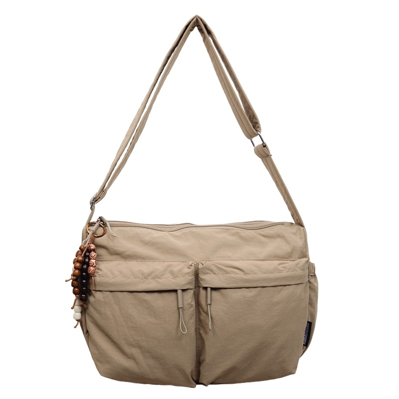 Nova jesensko–zimska crossbody torba s višestrukim džepovima i velikim kapacitetom, moderan minimalistički stil, ležeran i svestran