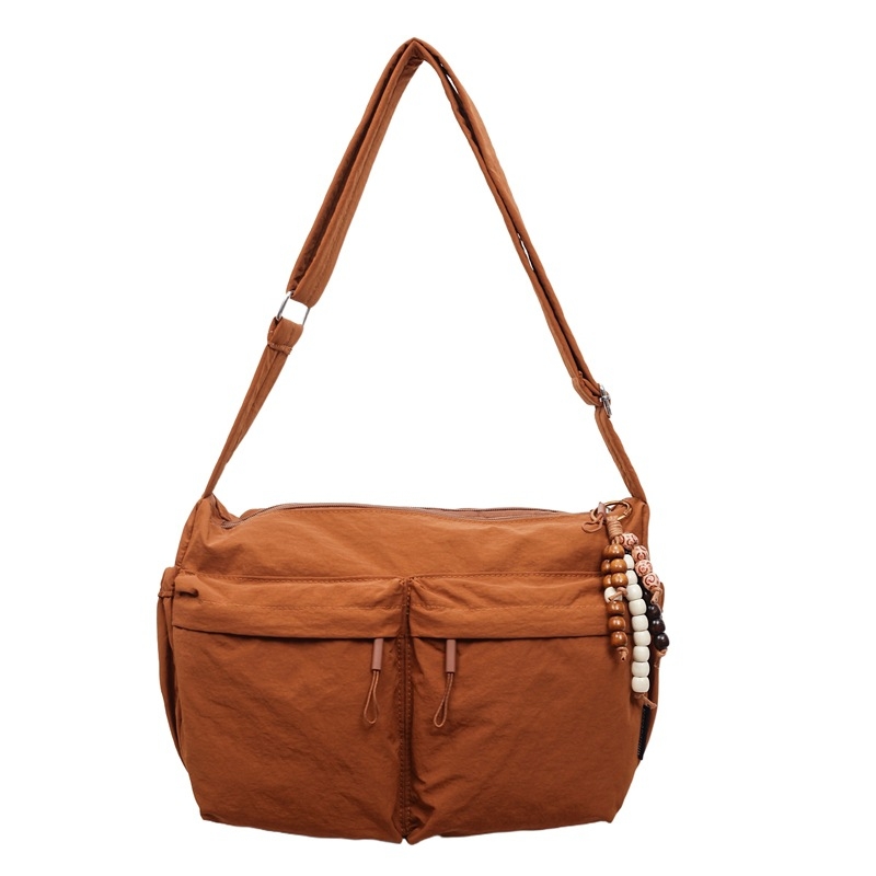 Nova jesensko–zimska crossbody torba s višestrukim džepovima i velikim kapacitetom, moderan minimalistički stil, ležeran i svestran