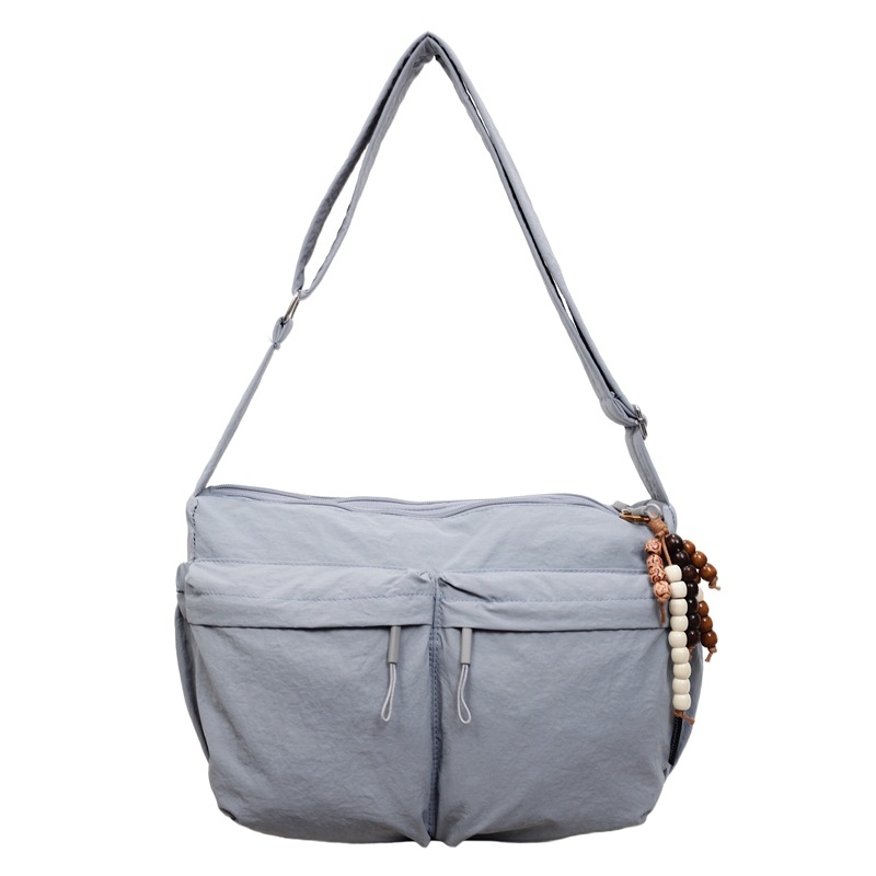 Nova jesensko–zimska crossbody torba s višestrukim džepovima i velikim kapacitetom, moderan minimalistički stil, ležeran i svestran