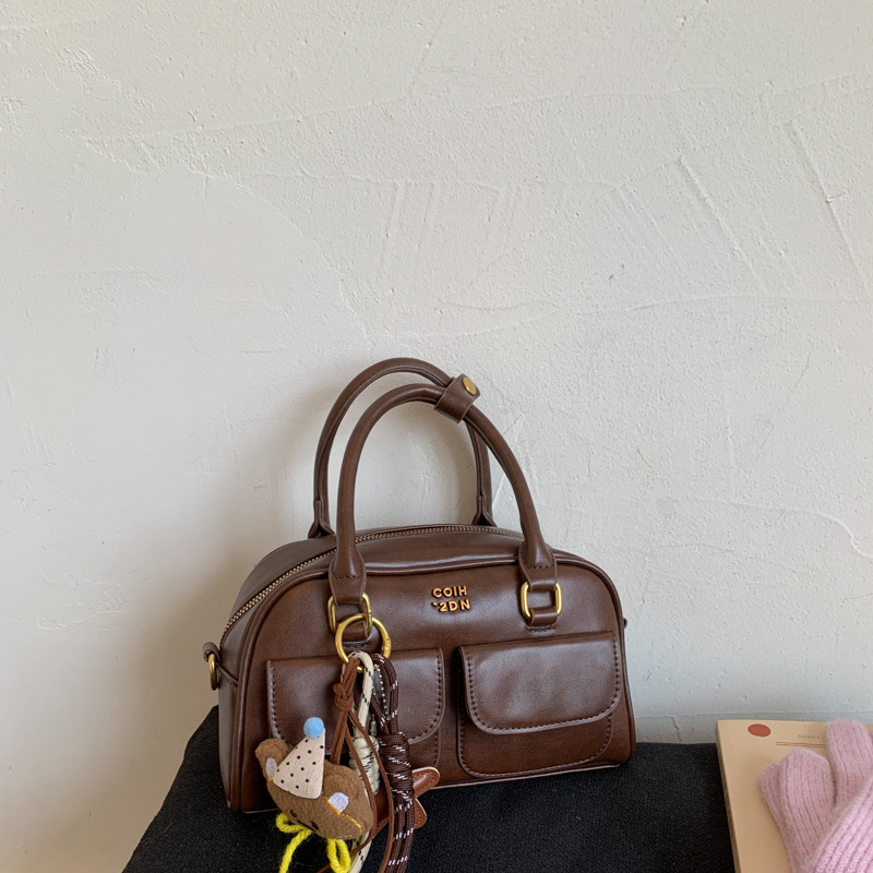 Urban minimalistička torba za rame i crossbody, PU koža, mala kvadratna torba, srednje veličine, jesen 2025, podstava od poliestera, horizontalni kvadratni oblik, zatvaranje zipom, inspirirano korejskim stilom.