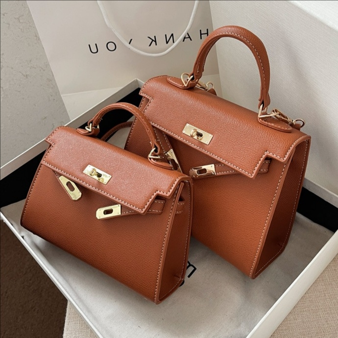 Nova teksturirana mala ženska crossbody torba za 2026. godinu, moderan modni stil, Kelly stil torba
