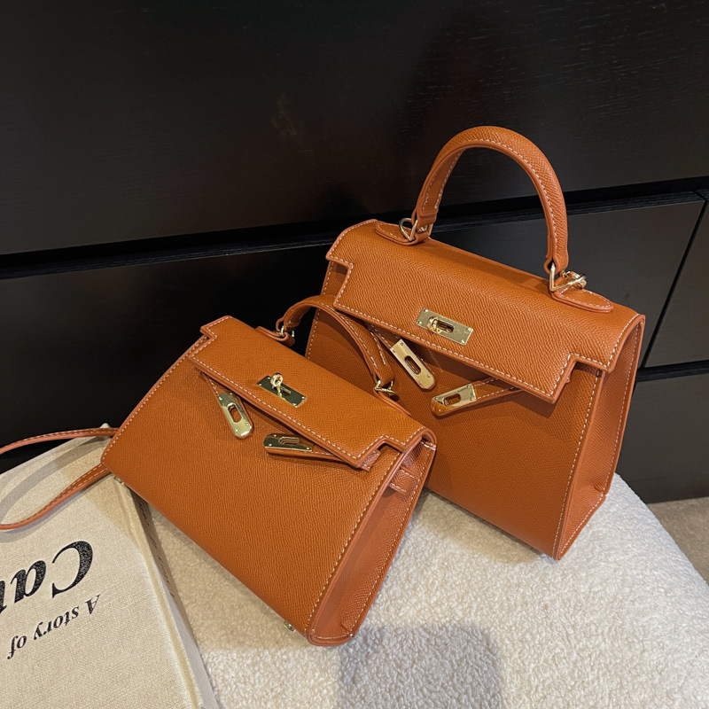 Nova teksturirana mala ženska crossbody torba za 2026. godinu, moderan modni stil, Kelly stil torba