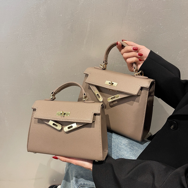 Nova teksturirana mala ženska crossbody torba za 2026. godinu, moderan modni stil, Kelly stil torba