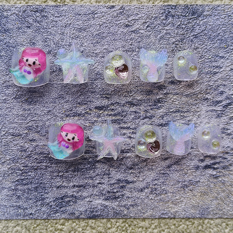 Kézzel készített gyerekeknek szánt körömdíszítő matricák tengeri csillag és sellő motívummal, rövidek, eltávolíthatók, nem mérgezőek