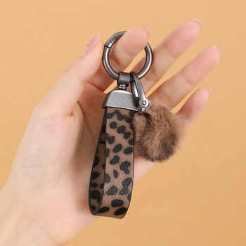Privjesak za ključeve od umjetne kože s leopard uzorkom, zapadnjački kaubojski stil, uljane ivice, privjesak za torbu, plišani kuglica i lanac za bocu vode