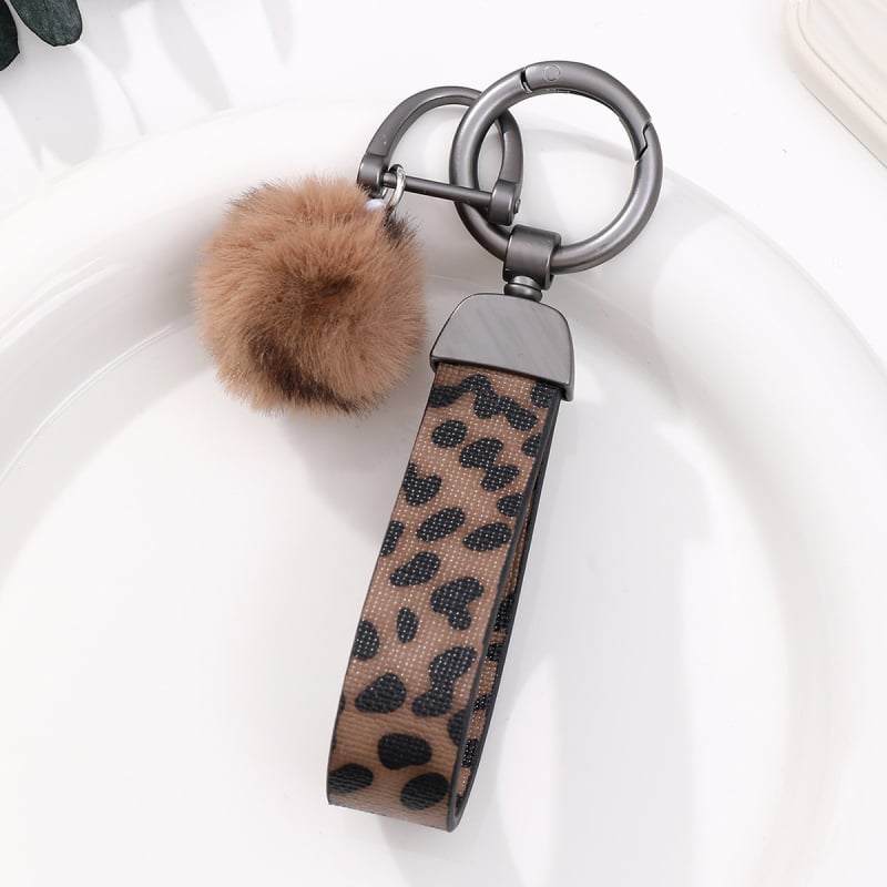 Privjesak za ključeve od umjetne kože s leopard uzorkom, zapadnjački kaubojski stil, uljane ivice, privjesak za torbu, plišani kuglica i lanac za bocu vode