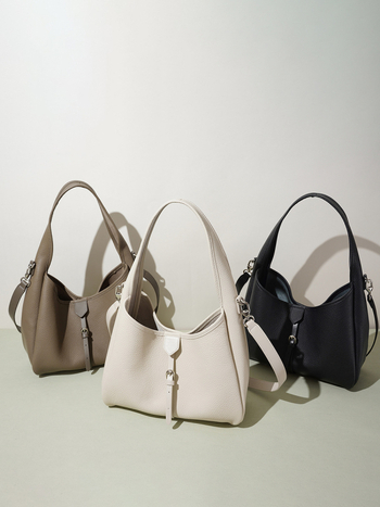 Prilagodljiva ženska kožna crossbody torba, dnevna i višenamjenska, nišni dizajn bucket torbe, minimalistički i elegantan izgled