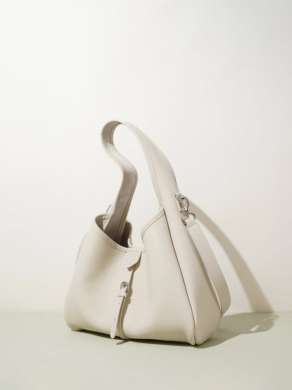 Prilagodljiva ženska kožna crossbody torba, dnevna i višenamjenska, nišni dizajn bucket torbe, minimalistički i elegantan izgled