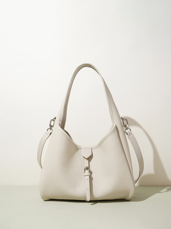 Prilagodljiva ženska kožna crossbody torba, dnevna i višenamjenska, nišni dizajn bucket torbe, minimalistički i elegantan izgled