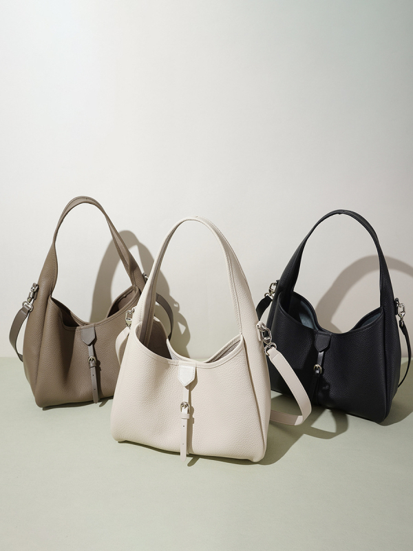 Prilagodljiva ženska kožna crossbody torba, dnevna i višenamjenska, nišni dizajn bucket torbe, minimalistički i elegantan izgled