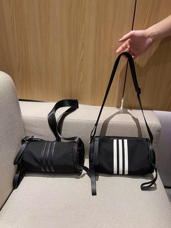 Nova casual crossbody torba s velikim kapacitetom, cilindričnog oblika, od Oxford platna