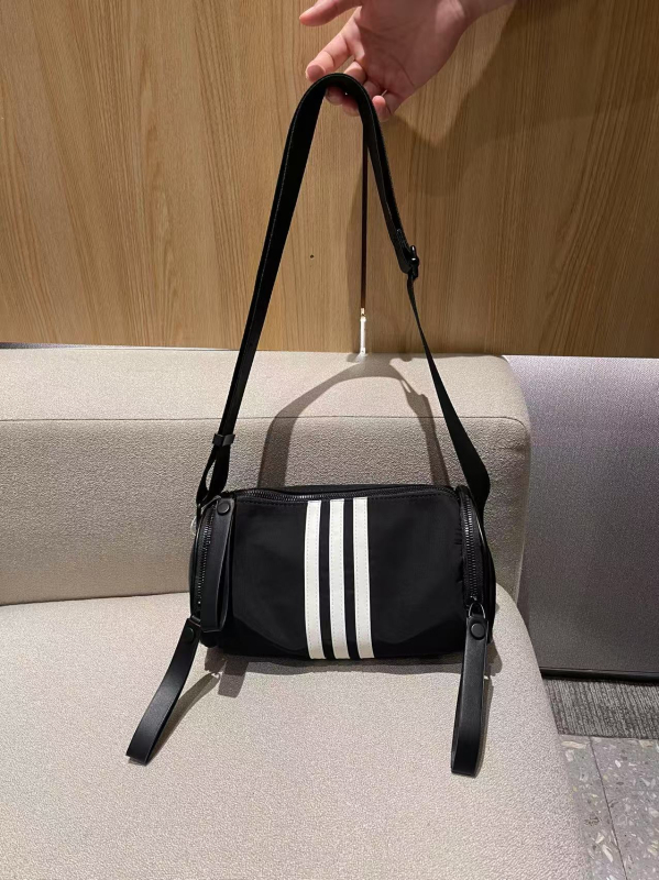 Nova casual crossbody torba s velikim kapacitetom, cilindričnog oblika, od Oxford platna